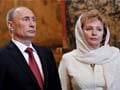 Wife alongside Putin in rare Kremlin appearance