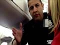 Flight attendant asks passengers to leave plane if they dare