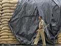 India may offer wheat to firms, poor as stocks rot
