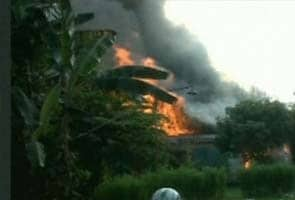 Nine die as Indonesian Air Force plane crashes into housing complex