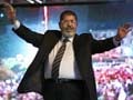 Mohammed Morsi, Egypt's first elected leader says 'national unity is the only way out'