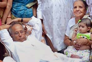 Pranab visits ancestral home in Bengal, promises market booster on Monday