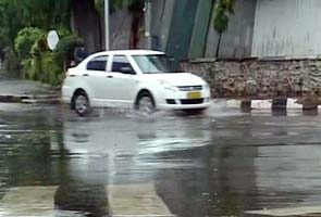 Mumbai roads, trains hit by heavy rain, more to come says met dept