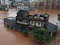 Rain storms kill at least 37 in Beijing