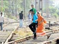 Train runs over mother crossing tracks with child