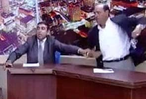 MP whips out gun, hurls shoe as live TV show turns ugly 