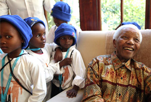 Mandela enjoys his 94th birthday party surrounded by family and friends