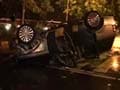 Speeding SUV turns turtle, catches fire near Prime Minister's residence