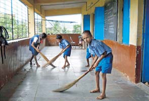 School shocker! Students forced to sweep floors before class