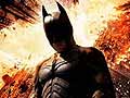 Movie massacre suspect mum; Batman mask found