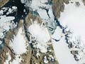 Massive iceberg breaks off Greenland glacier