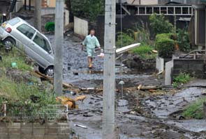 50,000 flee as record rain in Japan kills 17 