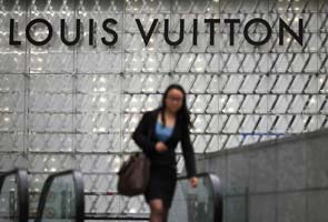 Louis Vuitton lures China's super-rich with custom leather 'art'