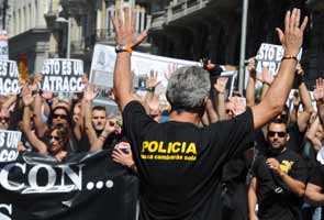 Spaniards take to streets in new protest against austerity 