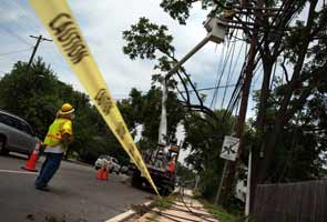 Power slowly returns as US heat wave drags on 