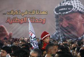 Palestinians agree to exhume Yasser Arafat's body over poison claim
