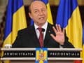 Romania court puts President Basescu back in office