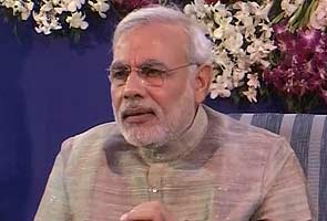 Follow Gujarat model to improve country's management: Narendra Modi tells PM