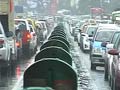 Heavy rains lash Mumbai, cause traffic jams and train delays