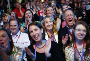 Mitt Romney's storm-delayed Republican convention limps into motion