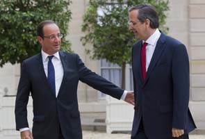 France's Hollande says Greece must remain in euro 