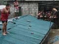 Rains flood Manila, displacing thousands