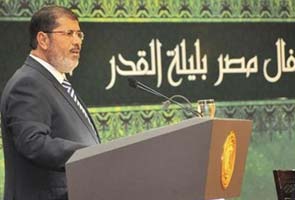 Egypt's President Mursi faces lawsuit over removal of power curbs