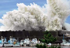 Japan on alert as typhoons loom
