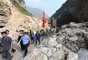 China earthquake survivors await shelter, supplies