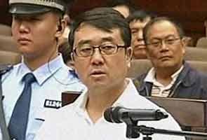 Ex-top cop in China scandal jailed for 15 years