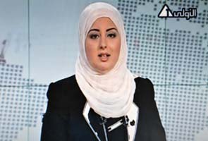 Egypt's veiled news anchor stirs debate
