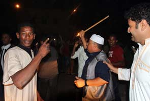 Libyan protesters eject militants from Benghazi, four killed 