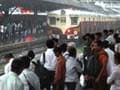 Mumbai rained in: Trains, flights delayed; landslide in Chembur