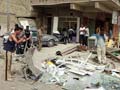 Explosions kill 58 in Iraq, French consulate hit