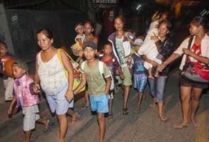 Thousands return home after Philippines quake, tsunami warning lifted