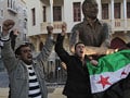 Rebels tear down Syrian flag at border post with Turkey