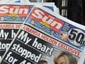 UK phone hacking probe: Sun journalists, police officer arrested for corruption
