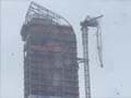 Superstorm Sandy: Crane dangles from New York high-rise, clearing streets