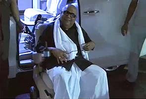 Karunanidhi, man in black