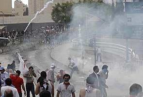 Clashes break out in Beirut after slain official's funeral