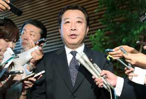Japan's prime minister reshuffles cabinet, names new finance minister 