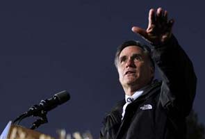 Mitt Romney takes 'feel-your-pain' tone as Superstorm Sandy slams East Coast