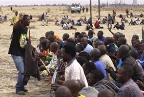 Work resumes at South Africa's troubled Marikana mine