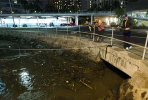 Hawaii tsunami warning lifted after 100,000 flee to higher ground