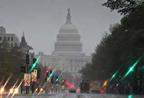 Superstorm Sandy could buoy or bite either US candidate