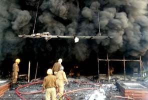 Mob sets shops near Delhi Metro's Karkardooma station on fire