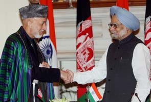Hamid Karzai meets PM Manmohan Singh, India-Afghan sign four agreements