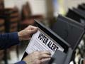 Voters grumble in storm-hit US state