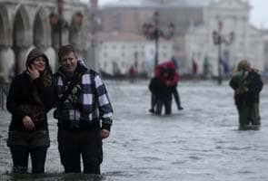 Three die in Italy floods as heavy rain continues