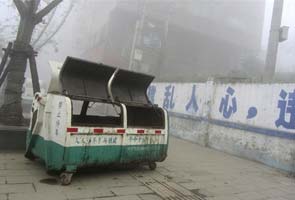 Dark side of thriving China: five kids die in trash